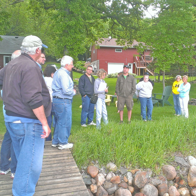 Learning the benefits of lakeshores restored with native plants-Natural Shore 